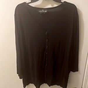 Women’s black tunic.